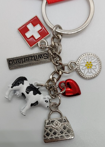 KEYRING WITH COW & BAG & RED HEART & SWISS FLAG & EDELWEISS